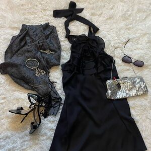 Brand new with tags. Black knee length dress. Express, size x-small